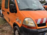 an orange van that is parked on the side of the road