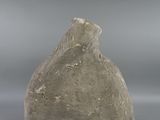 an image of a stone object on a gray background