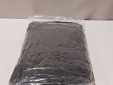 a plastic bag of food on a white table