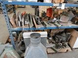 many different types of metal items on a shelf