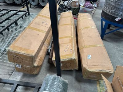 a pile of boxes sitting on a pallet in a warehouse