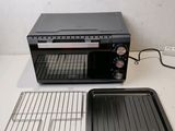 an image of a toaster oven and a pan on a counter