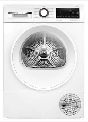 a white dryer sitting on top of a dryer in front of a white wall