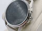 a watch that is sitting on top of a display