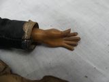 a hand that is on a table with a cloth