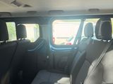 the interior of a car with the back seats folded down