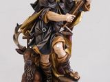 statue représentant un homme muni d'une épée et d'un chien assis sur un rocher