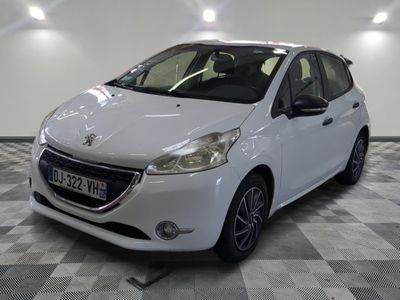 a picture of a white car parked in a garage