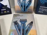 four different types of shavers are on display on a table