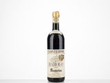 a bottle of wine sitting on top of a white table