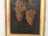 une photo d'un tableau représentant une grappe de raisin