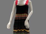 a mannequin wearing a multicolored dress on a mannequin