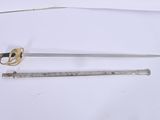 two swords and a ruler on a white surface