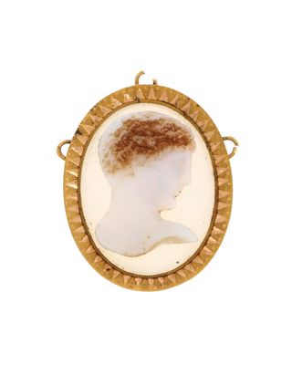 a close up of a picture of a woman ' s head in a gold frame