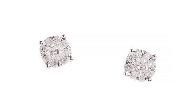 a pair of diamond earrings on a white background