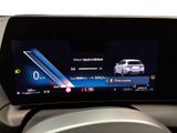 a picture of a car dashboard with a digital display on it