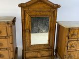 three pieces of furniture including a dresser, mirror, and chest of drawers