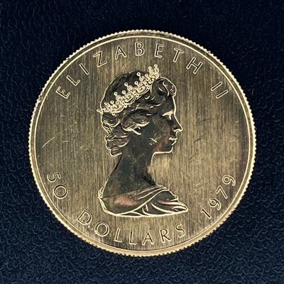 une image montrant un gros plan d'une pièce de monnaie sur laquelle figure le visage d'une femme