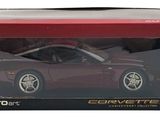 the toy car is in the box on the white background