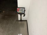 an image of a scale on the floor of a building