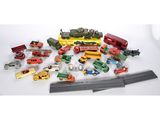 a lot of toy trains and cars on the table