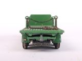 a green toy truck with a chain on the back of it