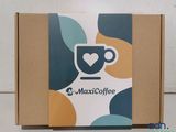 a close up of a box with a cup of coffee on it