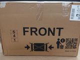 a cardboard box with a sign on it on a table