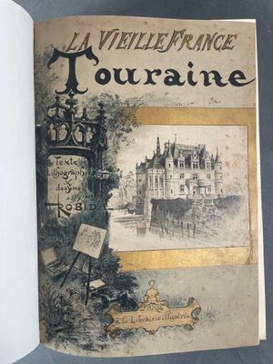 un vieux livre avec l'image d'un château en arrière-plan