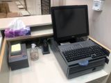a computer on a desk with a keyboard and mouse