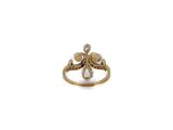 a close up of a gold ring with an octopus on it