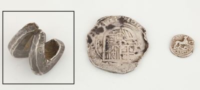 une image représentant une pièce d'argent sur laquelle figure un château