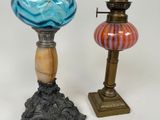 two lamps that are sitting next to each other on a table