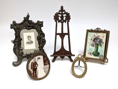 three framed pictures of a man and a woman are on display