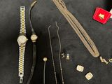 a lot of gold and silver jewelry on a table