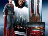 a close up of a statue of superman in front of a box