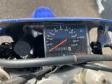 a close up of a motorcycle with a speedometer on it