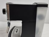 a coffee machine that is sitting on a table