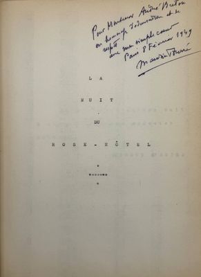 an open book with handwriting on it and a handwritten note
