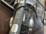 a vacuum that is sitting on a table next to a pair of scissors
