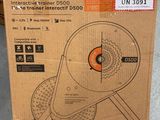 cardboard box with a drawing of a tennis racquet on it