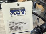 a label on the handlebar of a bicycle that says velo
