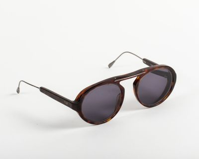 a close up of a pair of sunglasses on a white background