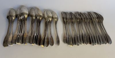 a lot of spoons that are sitting on a table
