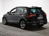 a picture of a black suv parked in a room
