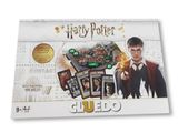 On joue actuellement au jeu de société « Harry Potter : Le Jeu des Indices » sur la table.