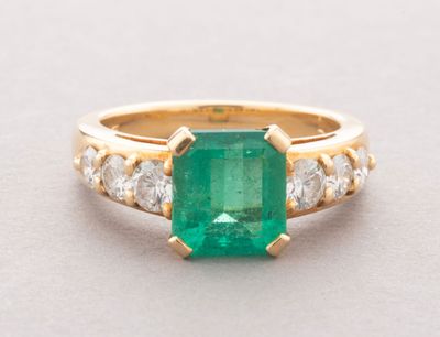 an emerald and diamond ring