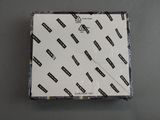 a close up of a white box with black and white stickers on it