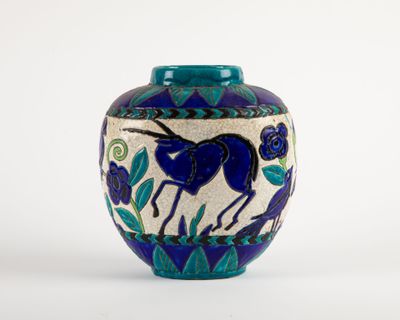 a blue vase with a horse on it on a white background