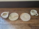 three plates and two cups of coffee on a wooden table